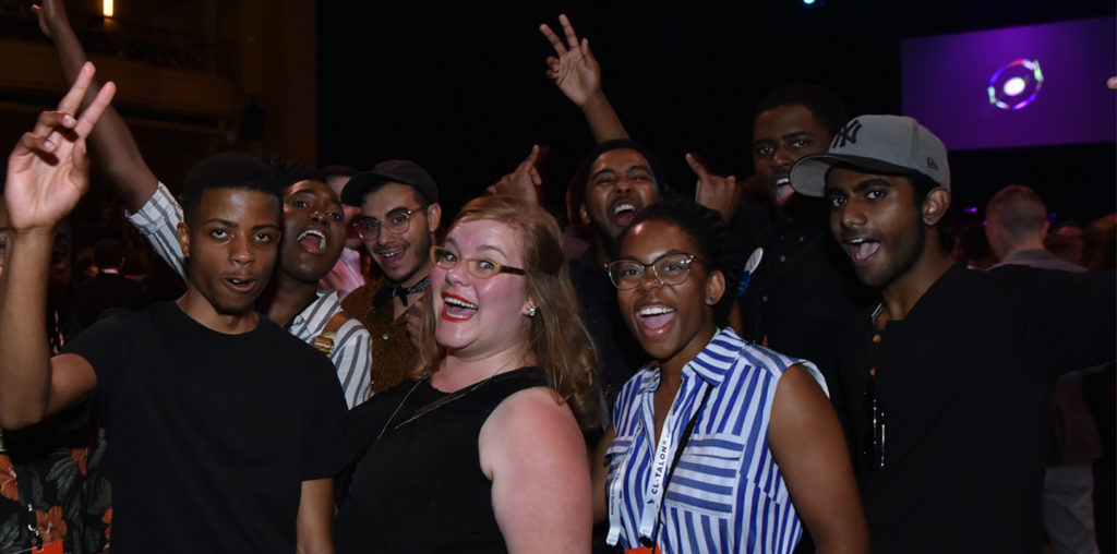 Young professionals happy at a party