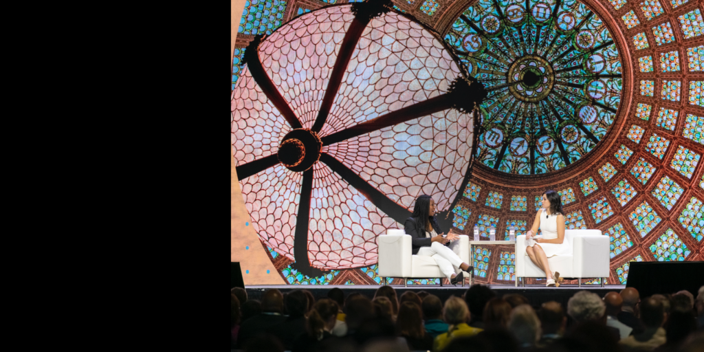 Lakisha Woods and Julia Gamolina in conversation on the keynote stage