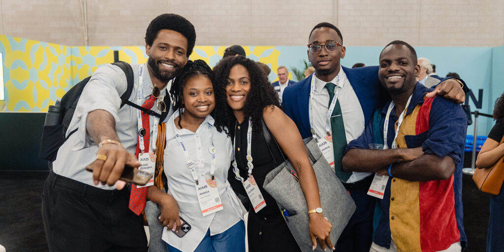 Group of conference attendees posing for a fun photo