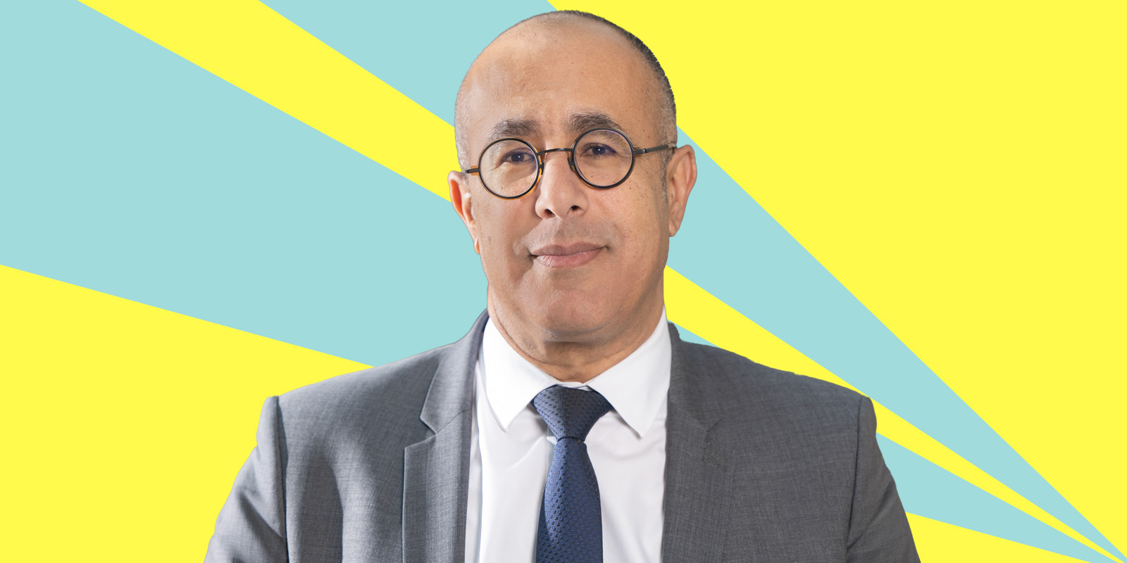 Sameh Wahba over a yellow and blue blackground